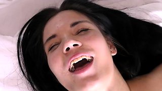 Small titted brunette teen fingering on the bed