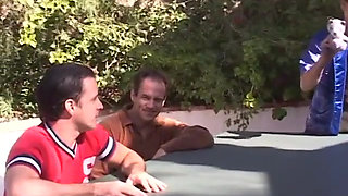 Horny black haired beauty sucks and fucks four men by the pool