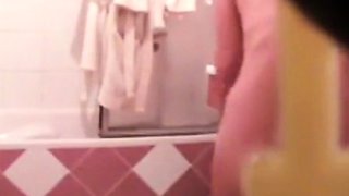 Skinny stepmom washing pussy in bathroom