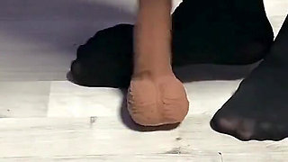 Sexy Dominatrix in Nylon Pantyhose Is Trampling Your Cock