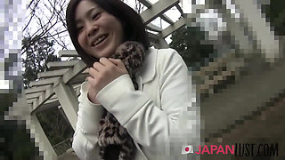Well dressed Japanese MILF strips for sex