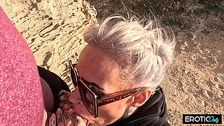 Tattooed Blonde MILF Enjoys Wild Outdoor Sex by the Beach