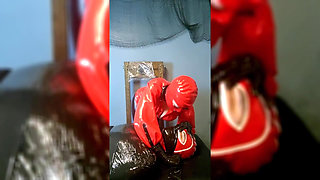 Extreme Breathplay on Mummified Slave in Latex