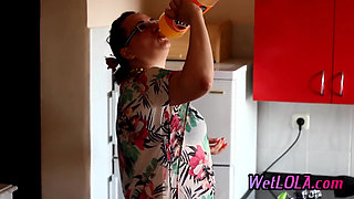 Mature Woman Drinks Juice and Pee All Over the Kitchen Floor While Playing with Her Pussy