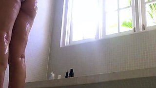 Nude adult lady flashes off fun bags in the shower