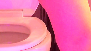 Emily pissing in the bathroom