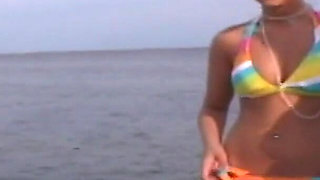 Three Hotties Play Naked on a Public Beach