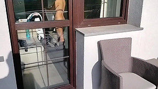 Dickflash for the Neighbor Girl Through the Window on the Balcony She Comes Out, Shows Her Tits and Touches Her Dick
