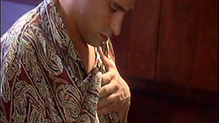 Sexy brunette in high heels gets drilled on a desk by a fit stud