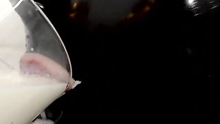 Rubber Slut Swallowing and Bathing in Milk