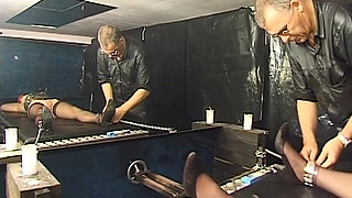 Mature MILF in Corset Gets Heavy Clamps Attached