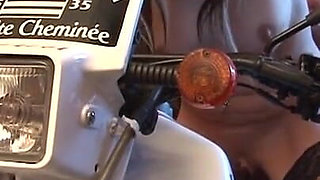 Skanky blonde rides motorcycle fucking machine