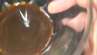 Ejaculating into a coffee cup and waking my slave to drink it.