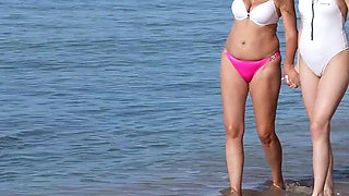 Stepmom and Stepdaughter on a Nudist Beach