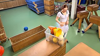 Flexible and horny gym attendant wants to see what's in the pants of the trainer