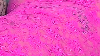 Tattooed Blonde in Pink Lingerie Seduces on Bed