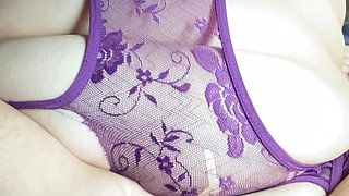 Close-up Latina in violet lingerie touching non-stop