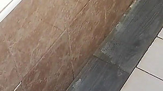 A Brunette Gets Pissed on