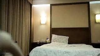 Cute amateur asian web cam girl playing with her toy