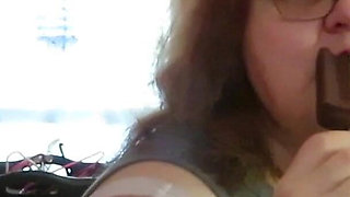 BBW nurse Vicki enjoys eatting a chocolate vanilla ice cream popsiscle