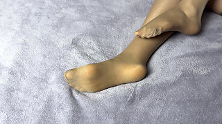 Secretary in Nylon Pantyhose Loves Her Long Legs