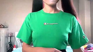 Skinny teen brunette masturbating with toy