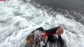 Lucy Lauren In A Wetsuit - Rope Bondage Escape Challenge On The Beach