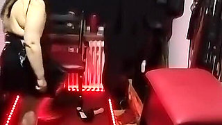 Mature Domme Stretches Sub's Ass with Glowing Plug Deep