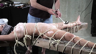 Tied up asian slut wearing glasses gets her pussy rubbed with hitachi by maledom