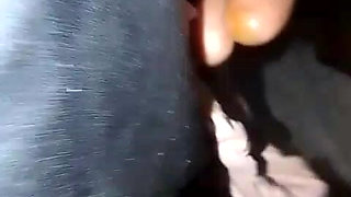 From the Side of the Big Ass of the Lady, She Takes the Panty Around the Black Rod and Hits It to Make Her Moan.
