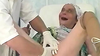 Hairy MILF gets fingered by her doctor