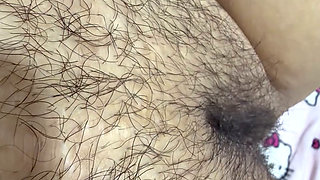 Hot mom massages her giant hairy pussy