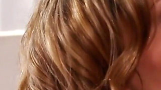 Hot lesbian action with blonde and brunette in the bedroom