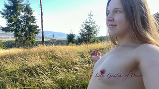 Walking in the Mountains Without T-shirt and Bra